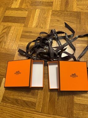 Hermès Orange Boxes with Branded Brown Ribbons